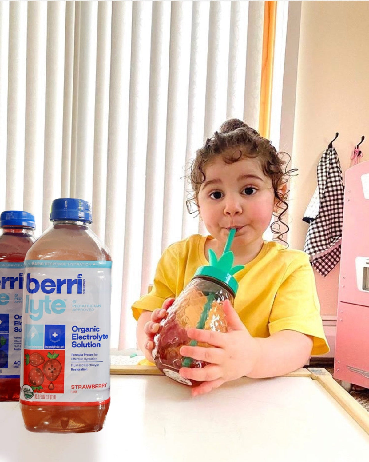 child drinking berri lyte