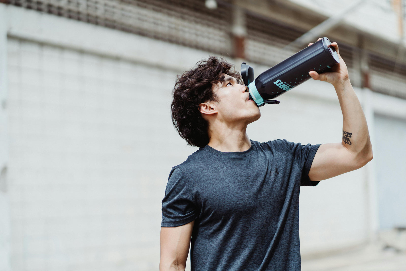 man hydrating | Berri Organics